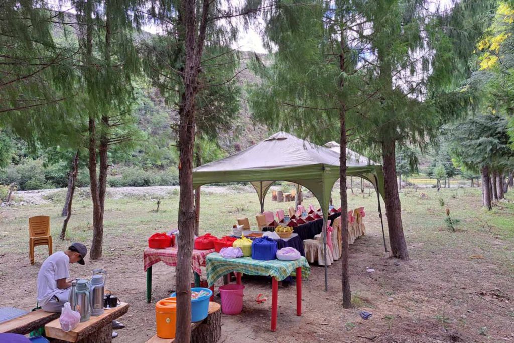 Lunch preparation by the riverside east Bhutan tour